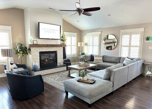 Smart TV, fireplace, books, video library