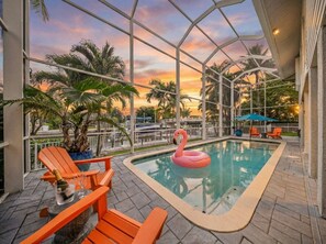 A heated pool - Waterfront Key West Retreat |Heated Pool| Dock|BBQ (Marco Island)