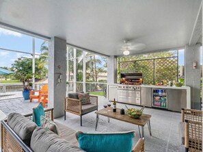 Outdoor dining - Waterfront Key West Retreat |Heated Pool| Dock|BBQ (Marco Island)