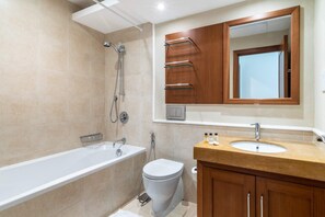 Basic Apartment, Multiple Beds | Bathroom | Towels, soap, shampoo, toilet paper