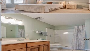 Un dormitorio con cama, mesita de noche y ventana. La imagen también muestra un baño con lavabo, espejo y ducha.
