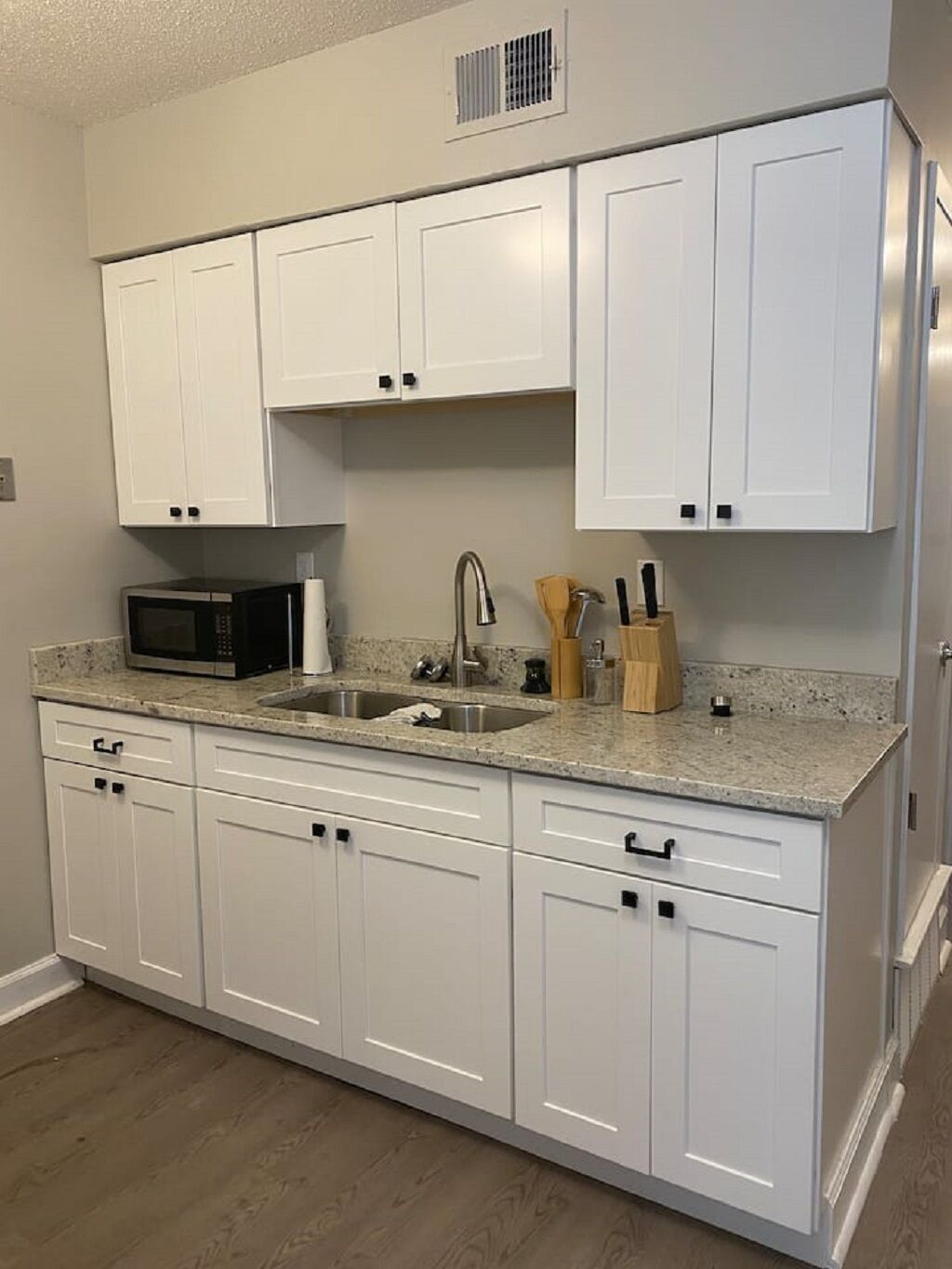 Fridge, oven, coffee/tea maker, cookware/dishes/utensils