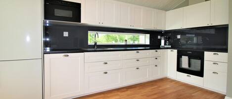 Fridge, oven, dishwasher, coffee/tea maker