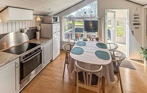 Fridge, stovetop, dishwasher, coffee/tea maker