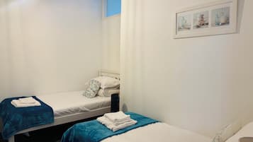 2 bedrooms, desk, iron/ironing board, travel cot