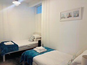 2 bedrooms, desk, iron/ironing board, travel cot