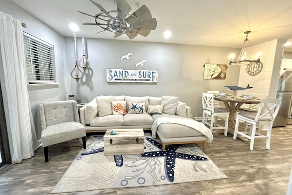 Updated living room & dinning room with a beachy vibe!