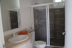 Shower, hair dryer, towels, soap