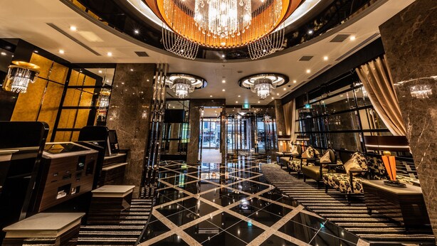 A luxurious lobby with a grand chandelier, marble flooring, and modern furnishings. - APA Hotel Kintetsu Nara Ekimae (Nara)