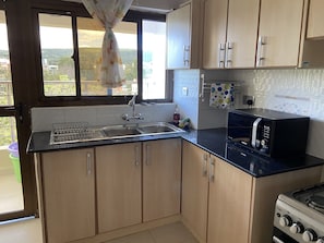 Full-size fridge, microwave, oven, stovetop - Midtown C32 Executive Suites (Nakuru)