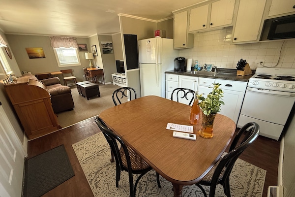 Open concept kitchen and living Open concept kitchen and living room area.