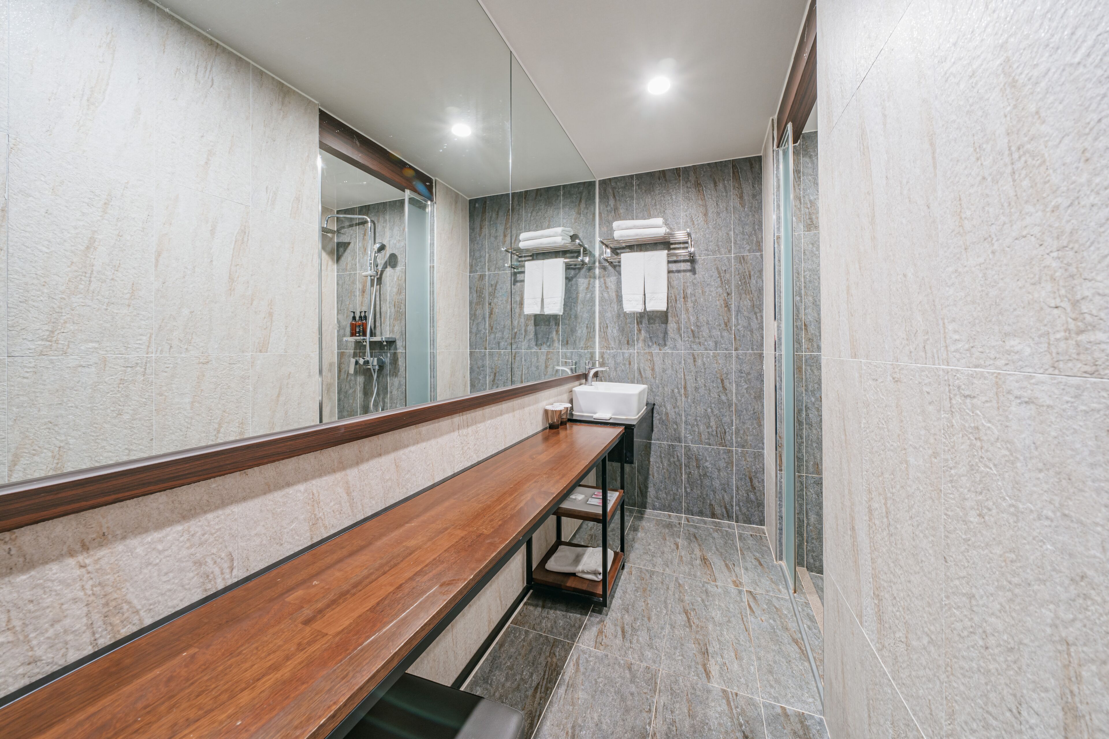 city twin room (for 2 people / no view) | bathroom | shower, free toiletries, hair dryer, slippers