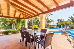 Outdoor dining - Stunning Country Home "Finca Sanau" Near the Beach with Sea View, Outdoor Pool, A/C, Wi-Fi, Garden, Balcony & Terrace; Parking Available (S'Horta)