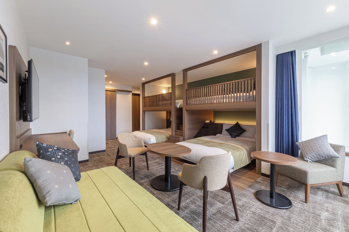 Deluxe 4-Bed Bunk Room, Non Smoking | 1 bedroom, in-room safe, desk, free WiFi
