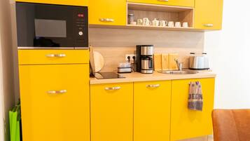 Fridge, microwave, coffee/tea maker, electric kettle