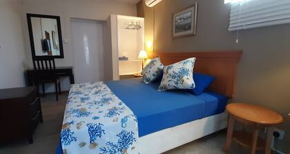 Luxury villa with secure pool 200m from Flic en Flac beach.