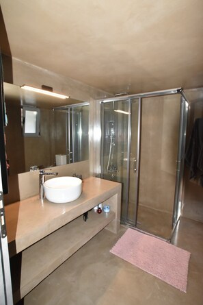 Bathtub, hair dryer, towels, soap
