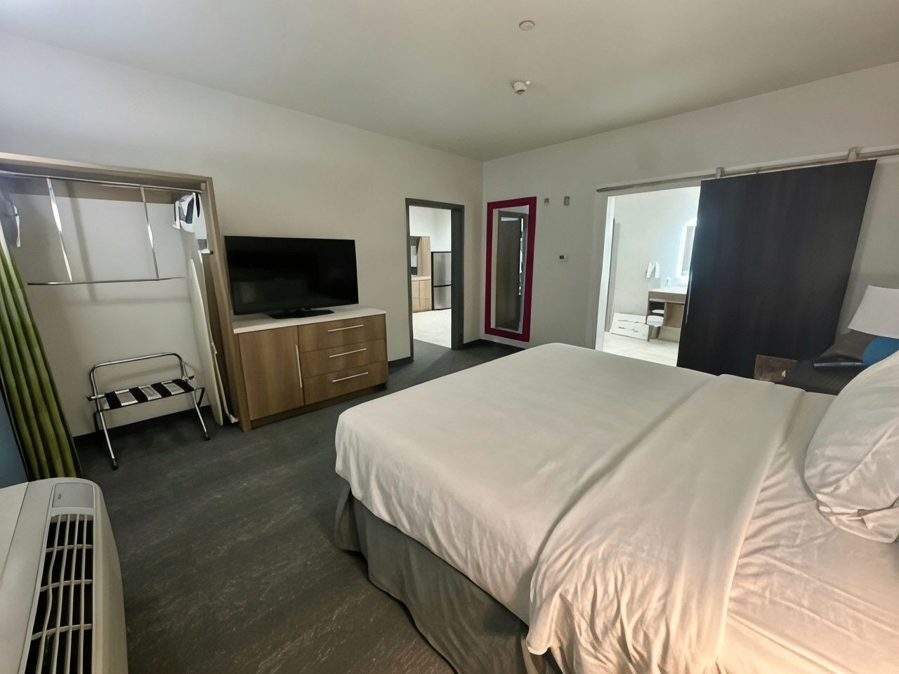Desk, laptop workspace, bed sheets