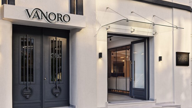 A modern hotel entrance with a dark door and a sign reading "VANORO". - Vanoro Hotel (Thessaloniki)