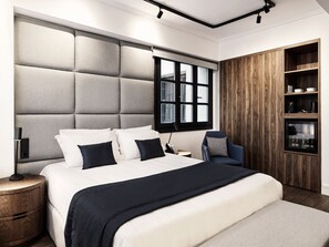 A modern bedroom with a large bed, a wooden wardrobe, and a window with blinds. - Vanoro Hotel (Thessaloniki)