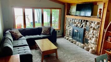 Smart TV, fireplace, DVD player, books