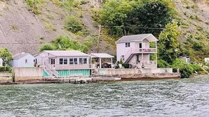 A waterfront property with a house and a dock. - Live your Best Vacation Life! Lovely 4 BR Property on Cayuga Lake.  Dog Friendly (Aurora)