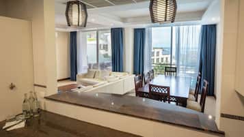 Presidential Suite, 3 Bedrooms, Kitchen, Ocean View | Living area | 42-inch flat-screen TV with satellite channels, TV