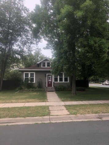 View of the front of the property. Entrance off driveway located off the alley.