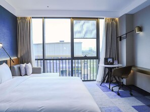 Standard Room, 1 King Bed | Down comforters, minibar, desk, free WiFi