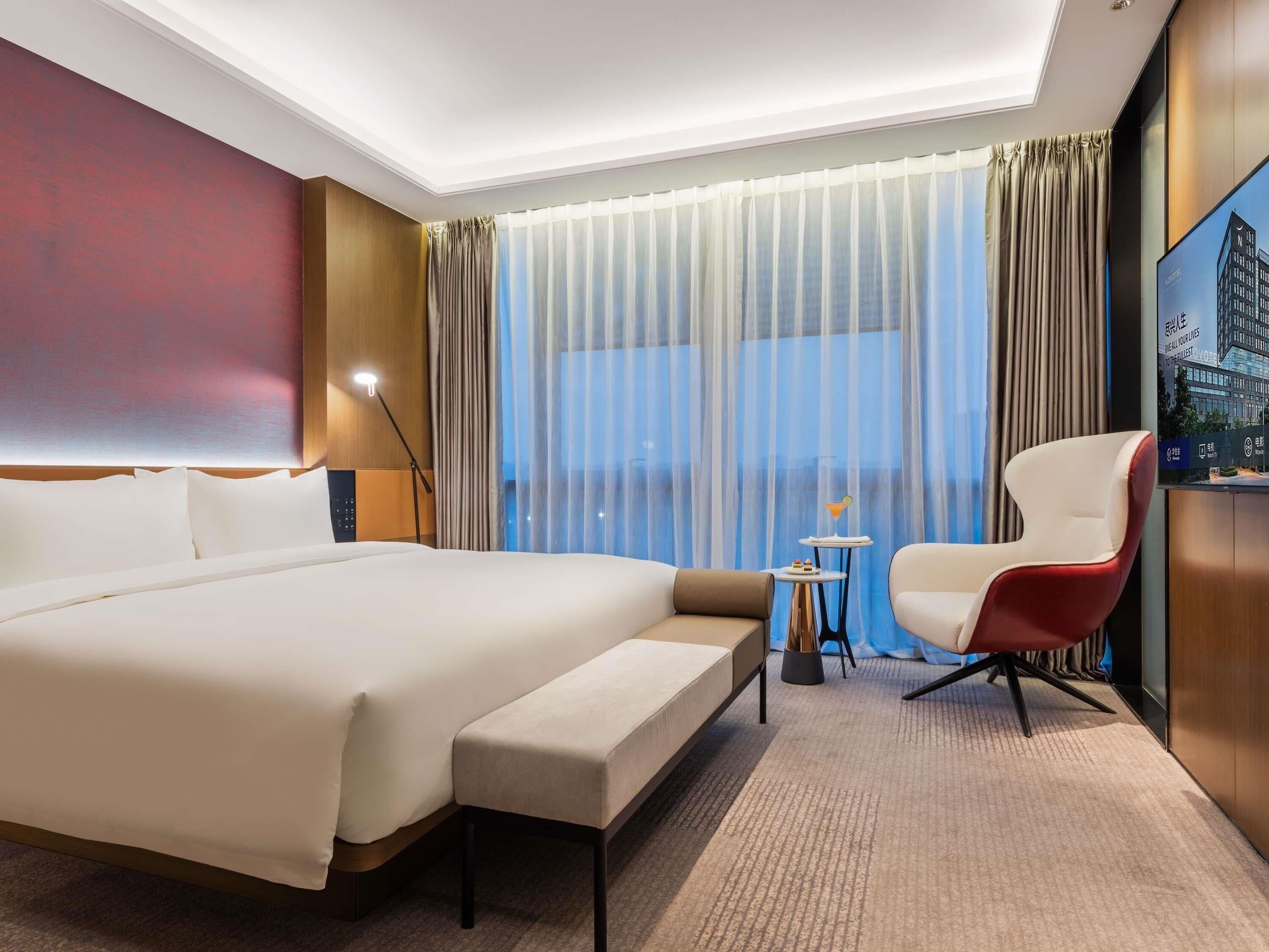 Suite Deluxe, 1 cama King size | Edredón, minibar, escritorio y wifi gratis 