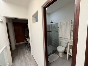 Shower, hair dryer, towels, soap