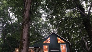 A cabin with a sloped roof, wooden deck, and large windows. - Relax Refresh & Reconnect  Lakefront on Autumn Lake, 3min to Salmon River (Orwell)