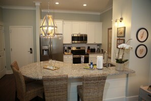 Fridge, microwave, oven, stovetop - Luxury Condo at Village Pier, King Bed,Full Kitchen, Polaris Ranger for Rent (St. Simons Island)