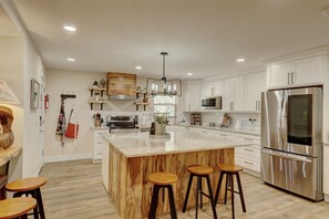 Private kitchen - Private Riverfront, HOT TUB, Game room & 4 Patios overlooking the Guadalupe! (Hunt)