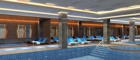 A modern indoor pool area with blue-tiled flooring, lounge chairs, and wooden panel walls.