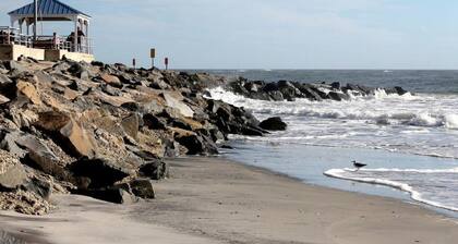 2 Bedroom Beachfront Ocean View, Pools Parking, Grills, Boardwalk. Sleeps six.