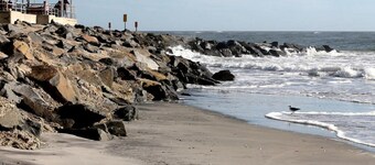 2 Bedroom Beachfront Ocean View, Pools Parking, Grills, Boardwalk. Sleeps six.