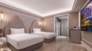 A modern hotel room with two beds, a TV, and a minibar. - Mercure Shijiazhuang People Square (Shijiazhuang)