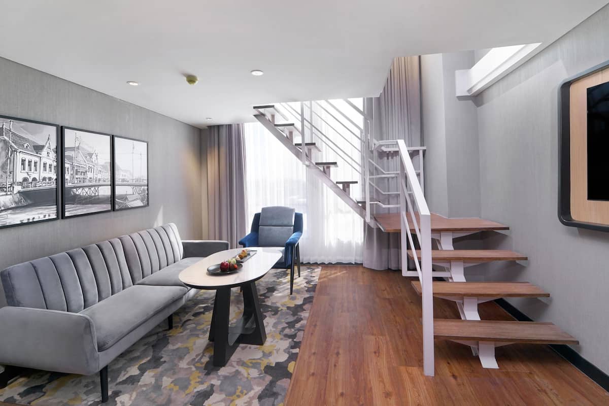 Suíte executiva, 1 cama Queen e sofá-cama | Roupas de cama premium, frigobar, cofres nos quartos, escrivaninha