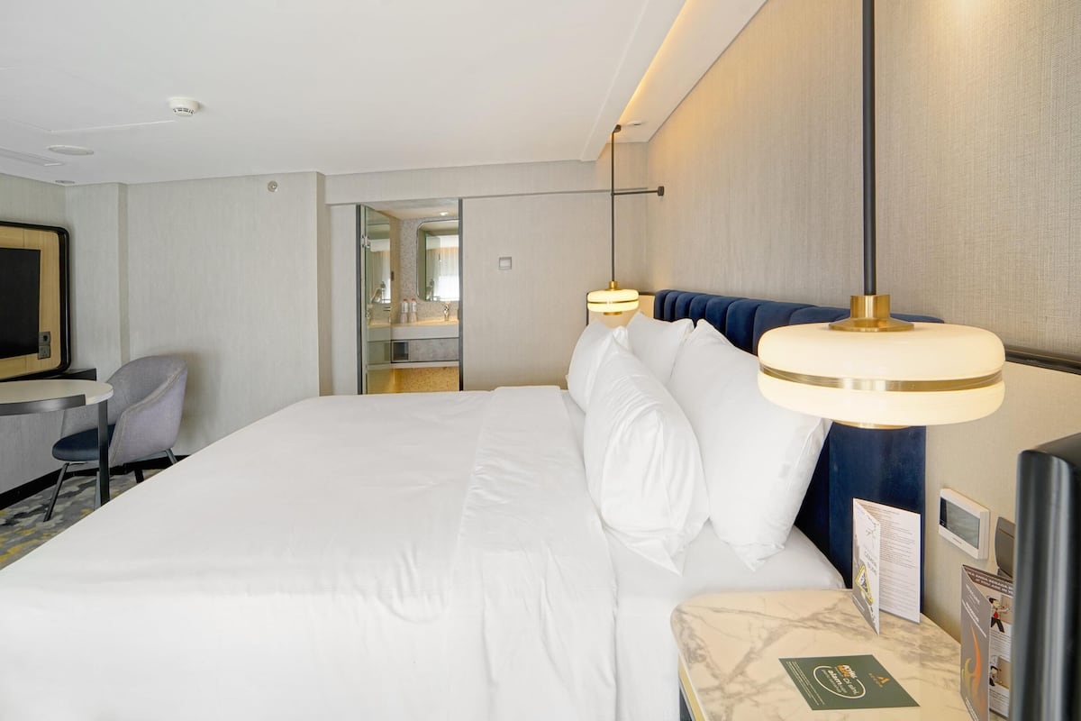 Suite exécutive, 1 grand lit et 1 canapé-lit | Literie de qualité, minibar, coffre-fort, bureau