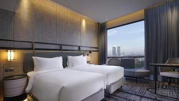 Deluxe Twin Room, City View | Premium bedding, minibar, in-room safe, desk