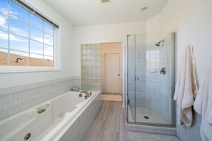 Shower, jetted tub, hair dryer, towels