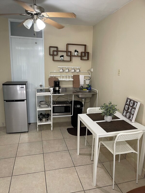 Microwave, coffee/tea maker, cookware/dishes/utensils