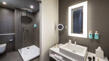 Shower, eco-friendly toiletries, hair dryer, towels
