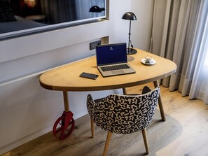 Edredón, camas Select Comfort y minibar 
