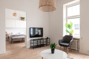 Comfort Apartment | Living area | 40-inch flat-screen TV with cable channels, TV - 2ndhomes Mikonkatu Apartments 4 (Helsinki)