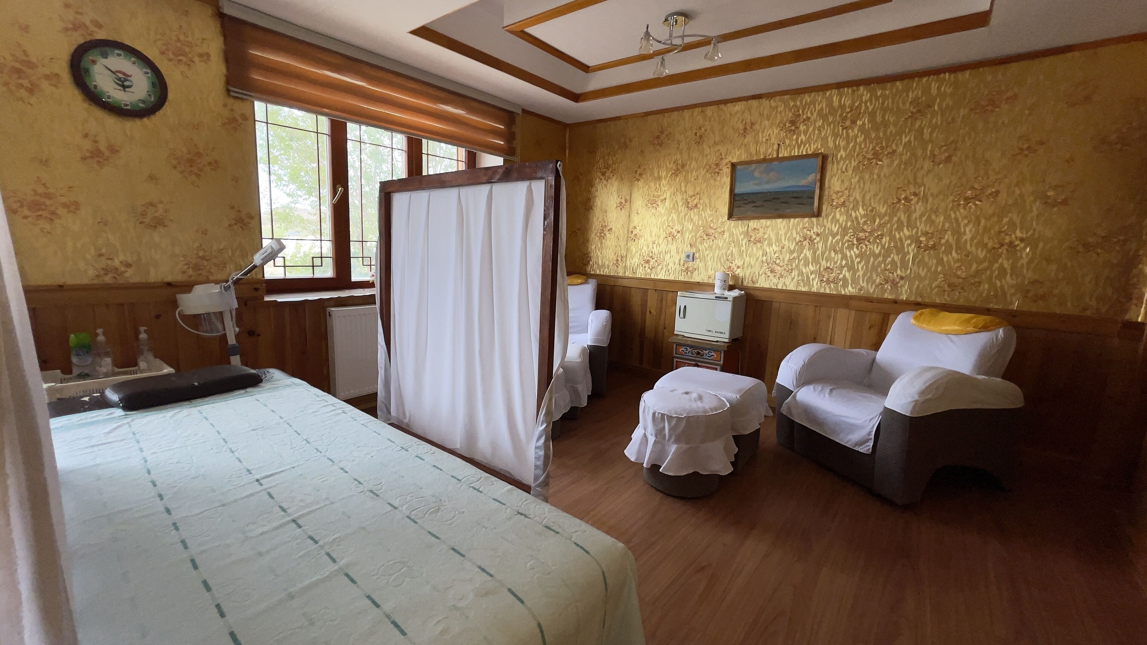 Massasje med varme steiner og massasje