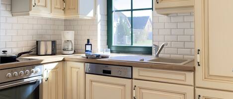 Fridge, oven, dishwasher, coffee/tea maker