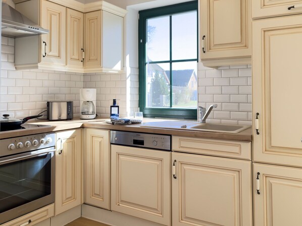 Fridge, oven, dishwasher, coffee/tea maker
