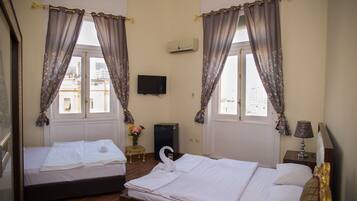 Roupas de cama premium, camas Select Comfort, frigobar